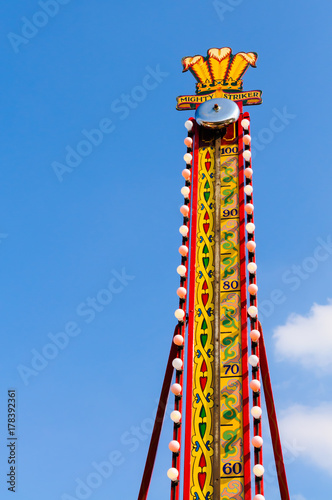 Photography Bell at the top of a Test Your Strength machine at a Victorian themed funfair