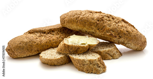 Two bagels and slices of whole wheat bran bread isolated on white background