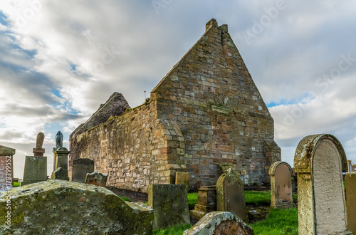 The ancient Ruins of St Nicholas' and Grave yard. photo