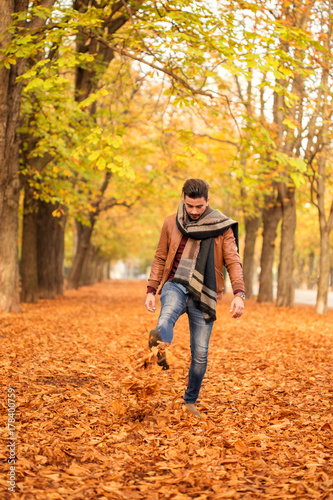 Lonely man walking in park alone