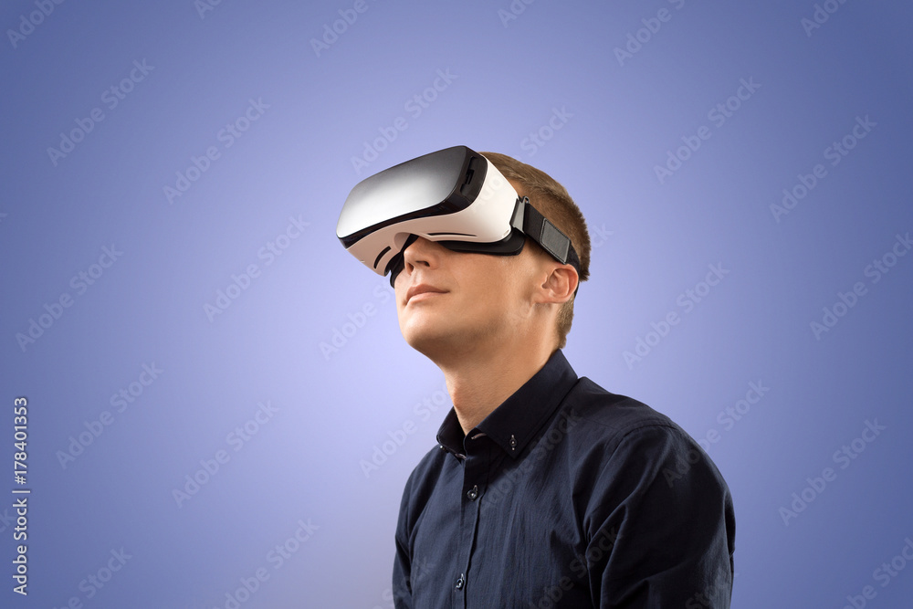 Smartphone using with VR glasses. Man wearing virtual reality glasses. Virtual reality today. Smartphone using with VR glasses. Man wearing virtual reality glasses. Virtual reality today.