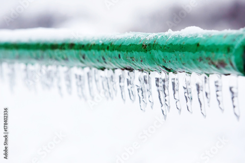 Wallpaper Mural Frozen icy down pipe, icicles Torontodigital.ca