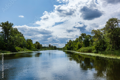 stormy clouds over the river, beautiful clouds over the water