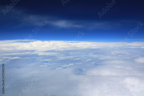 Clouds seen from the flight deck of an airplane.