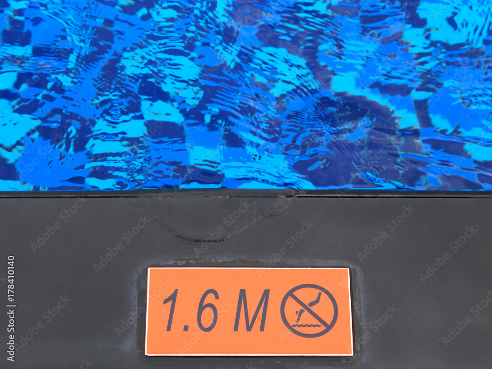 Sign showing 1.6 m depth and no diving warning.