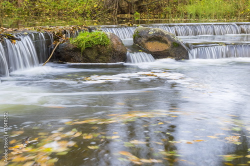 Waterfall in a autumn park