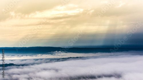Mountain  in morning sun ray and winter fog © NARANAT STUDIO