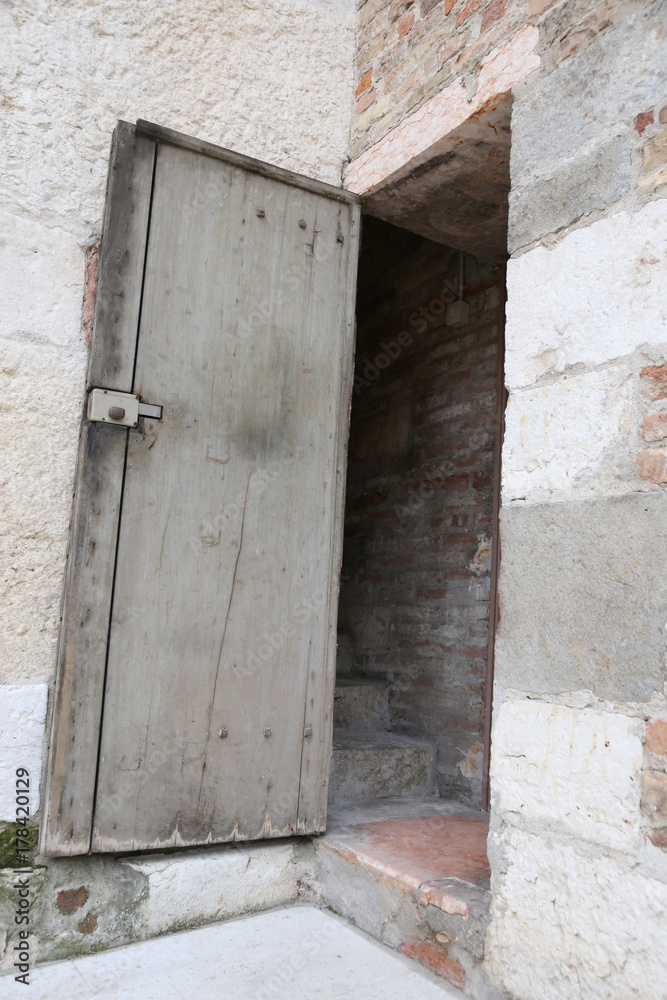 old wooden door of bell tower