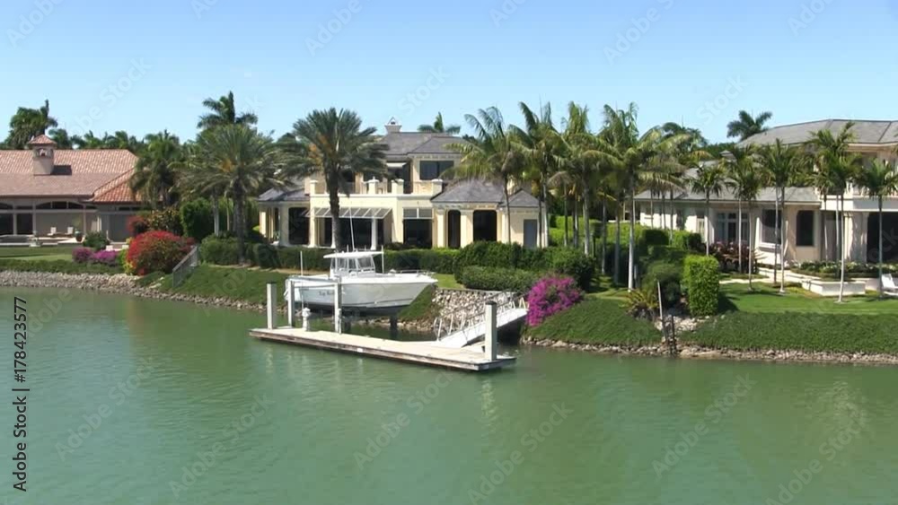 Waterfront affluent rich wealthy luxury homes mansions gated community