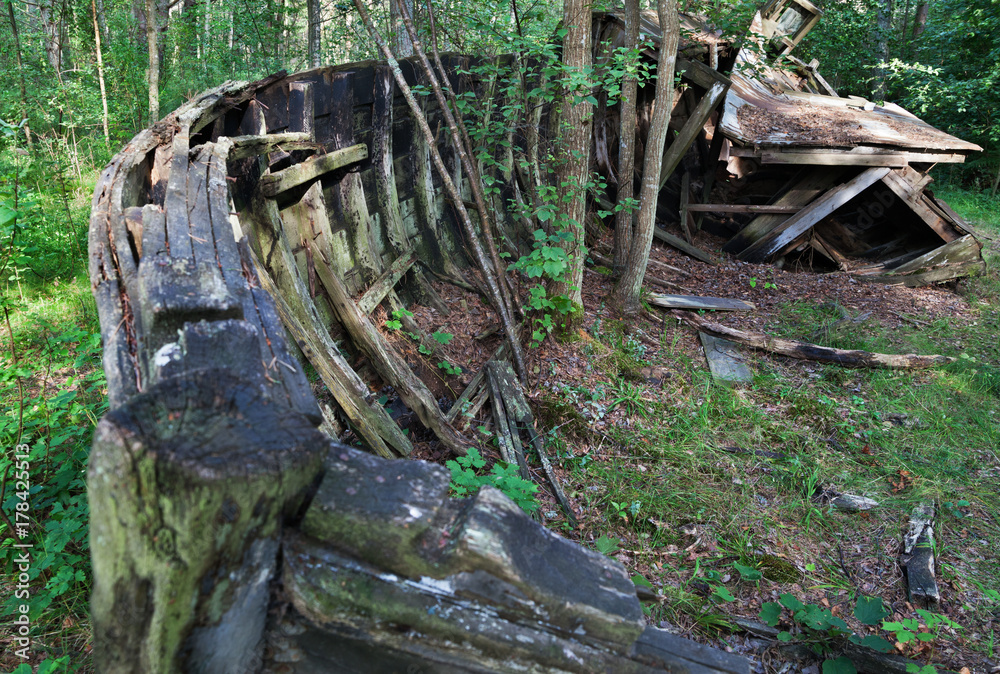 Old broken wooden boat.