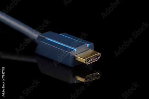 Blue HDMI cable on black background