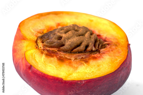 Macro view of appetizing half peach as a wallpaper