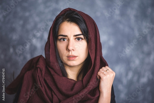 portrait of Arab women with long hair in a scarf