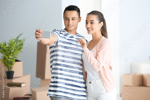 Happy young couple taking s...
