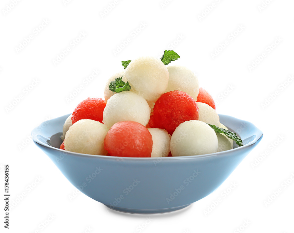 Melon and watermelon balls on plate, isolated on white Melon and watermelon balls on plate, isolated on white