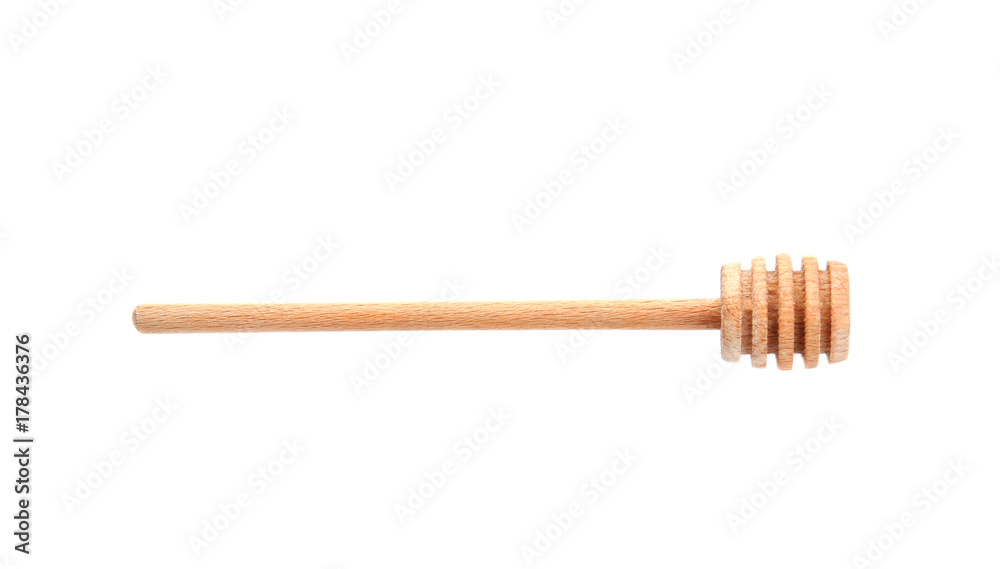Wooden honey deeper on white background Wooden honey deeper on white background