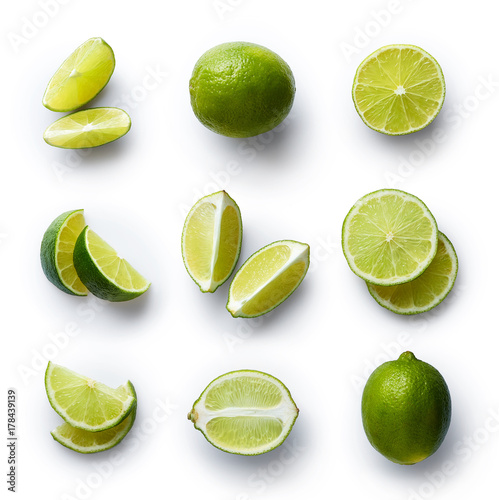 Valokuvatapetti Fresh lime isolated on white background