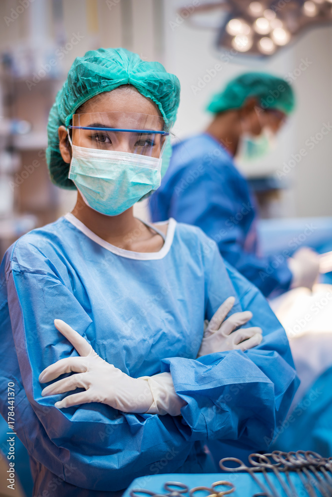 team of surgeons working in the operating room team of surgeons working in the operating room