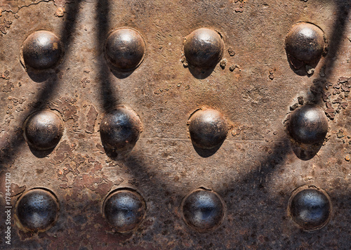 Fotografia Old rusty metal rivets