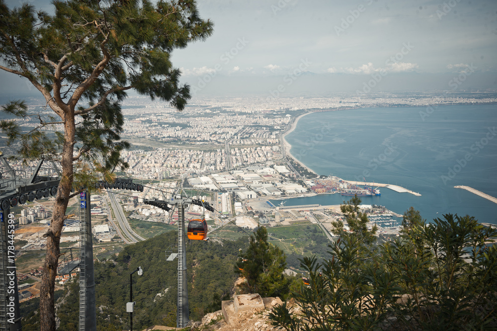 Fototapeta premium The view from the mountains on the Turkish resort town and the cable car. 8597