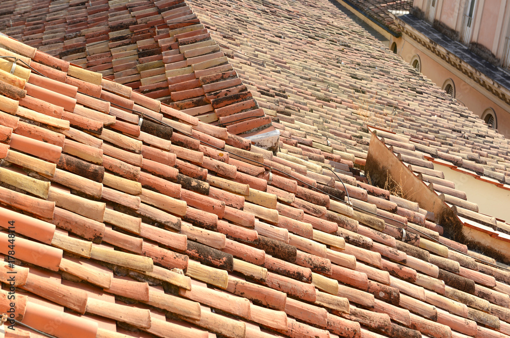 Closeup of tile roof on residential home in Rome Italy