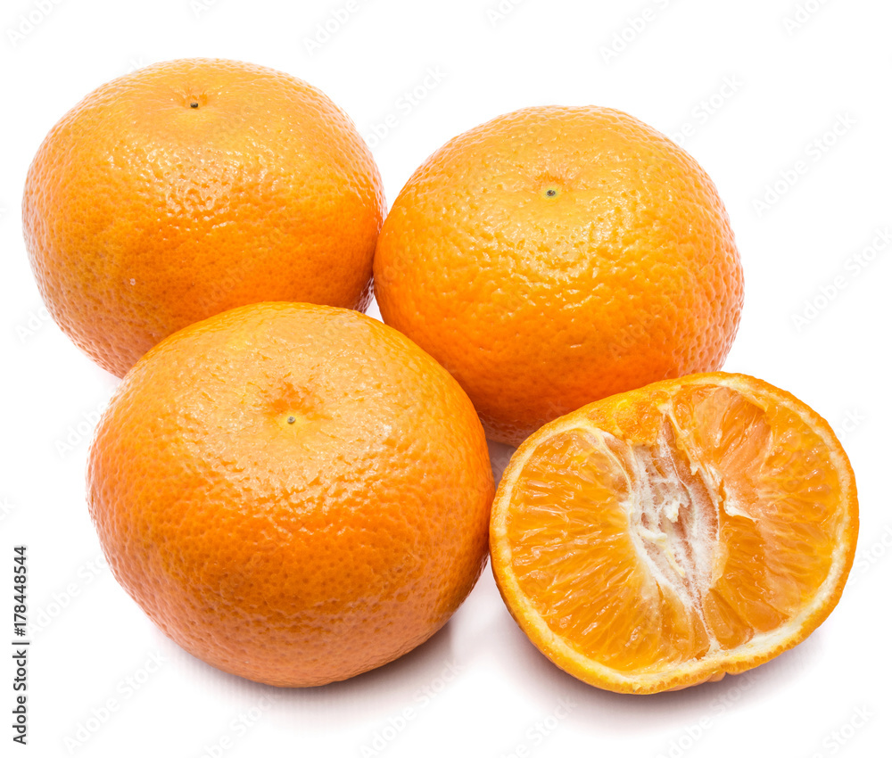 Three whole Clementines and one half isolated on white background Three whole Clementines and one half isolated on white background