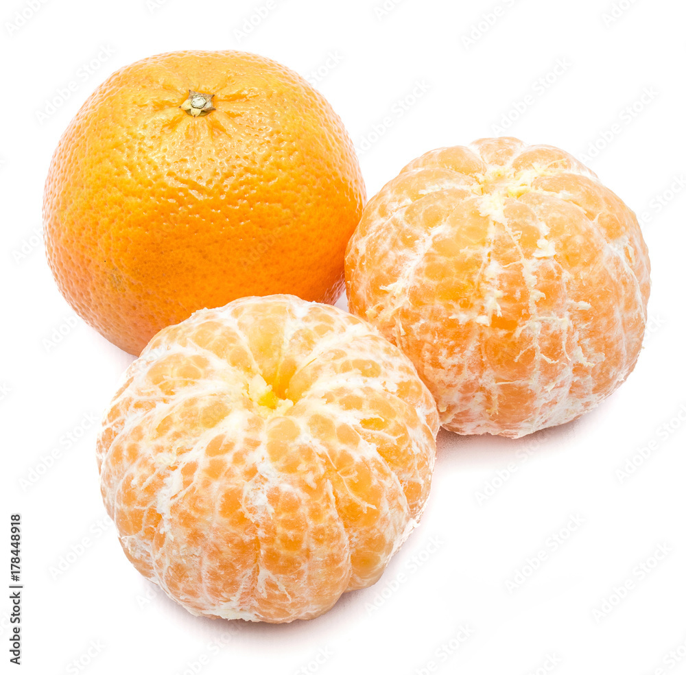 Three Clementines, one whole and two peeled, isolated on white background Three Clementines, one whole and two peeled, isolated on white background