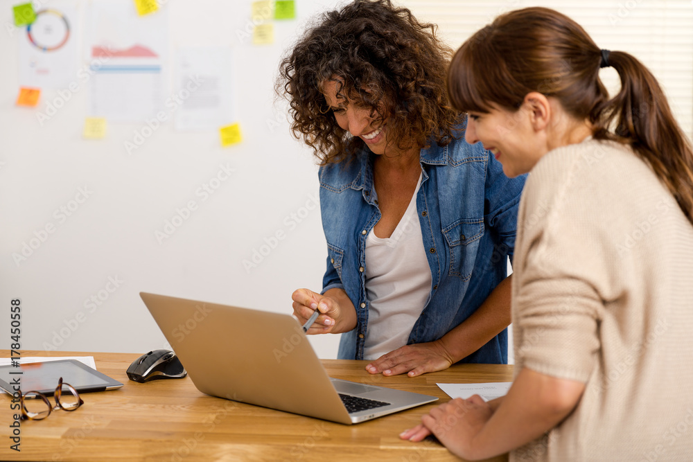 Two businesswoman working together Two businesswoman working together