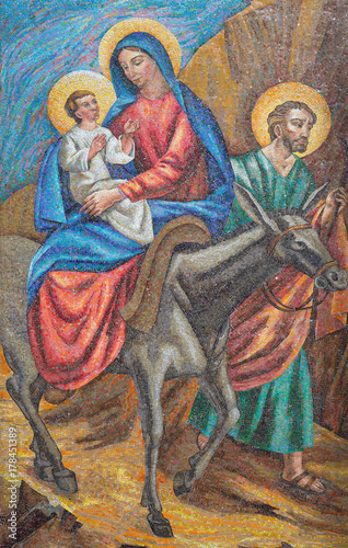 LONDON, GREAT BRITAIN - SEPTEMBER 17, 2017: The detail of the mosaic of The Flight to Egypt in St. Peter Italian church from 20. cent.