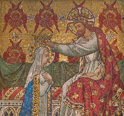 LONDON, GREAT BRITAIN - SEPTEMBER 18, 2017: The detail of mosaic of Coronation of Virgin Mary in sanctuary of church Immaculate Conception, Farm Street by Antonio Salviati 1875. photo