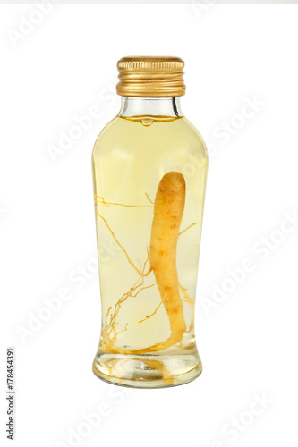 Glass jar of ginseng essence isolated on white