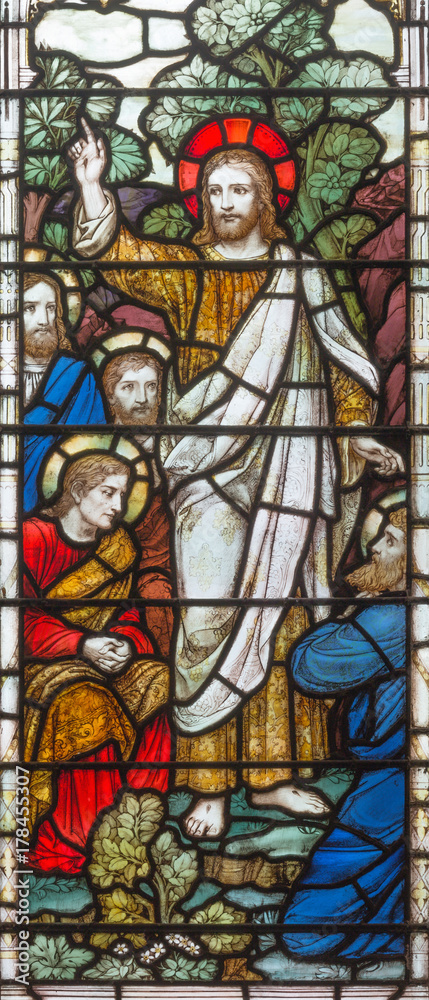 LONDON, GREAT BRITAIN - SEPTEMBER 17, 2017: The Apparition of resurected Jesus to apostle on the stained glass in church Holy Trinity Brompton.