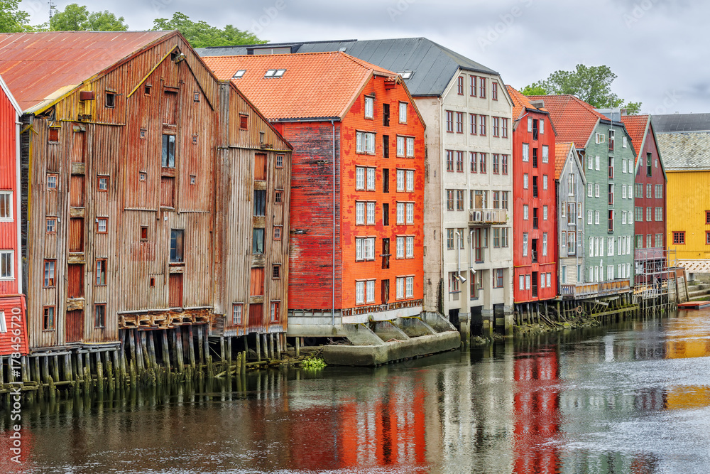 Historical Old Timber Buildings and the river Nidelva in Trondheim.