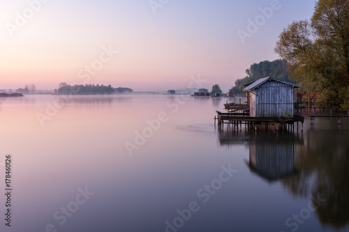 French countryside - Lorraine. A small lake with fisherman s hut at sunrise.