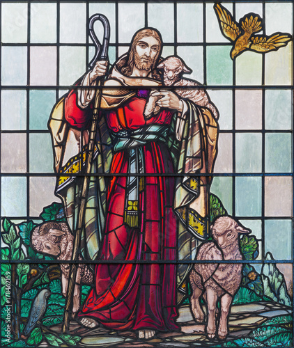 LONDON, GREAT BRITAIN - SEPTEMBER 15, 2017: The Jesus as The Good Shepherd on the satined glass of St James's Church, Clerkenwell (1938). photo