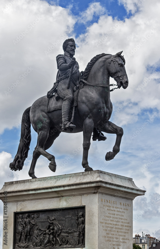 PARIS - Henrici Magni bronze equestrian statue near Pont Neuf. Representing the King of France Henri IV in armor, crowned with laurel and a scepter in his hand.