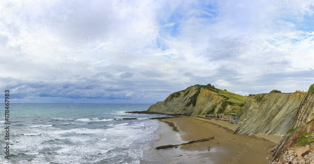 Itzurun beach is  known locally as the flysch at sunset near Zambia small town in Northern Spain