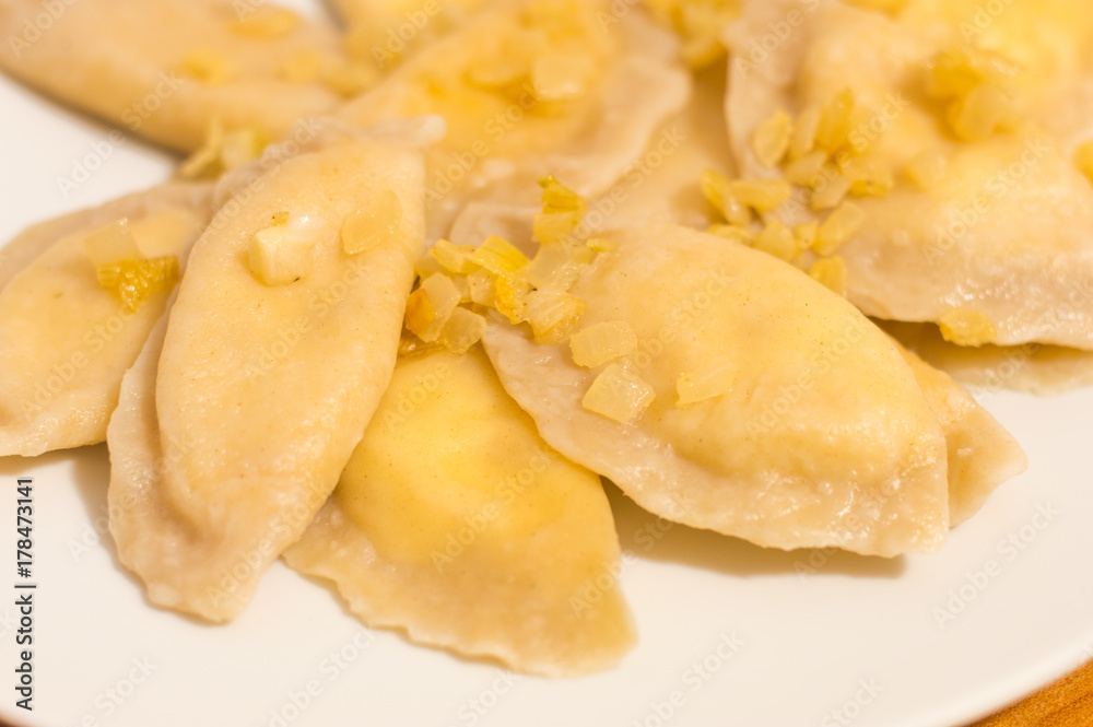 Dumplings with onion, quark and potato knows in Poland as Russian dumplings (Polish: Pierogi ruskie). Dumplings with onion, quark and potato knows in Poland as Russian dumplings (Polish: Pierogi ruskie).