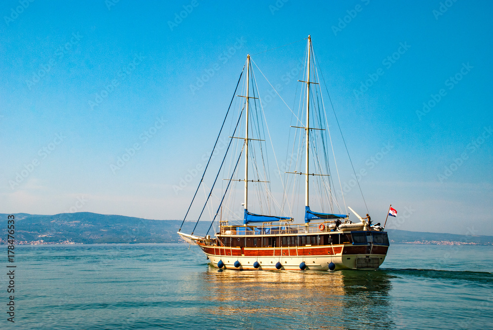 Sailboat with lowered sails