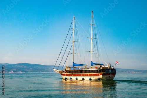 Sailboat with lowered sails