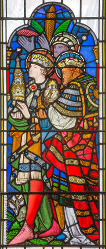 LONDON, GREAT BRITAIN - SEPTEMBER 14, 2017: The detail of Adoration of Magi on the stained glass in the church St. Michael Cornhill by Clayton and Bell from 19. cent. photo