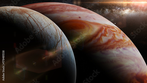 Fototapeta Naklejka Na Ścianę i Meble -  Jupiter's moon Europa, the planet Jupiter, the Milky Way and the Sun
