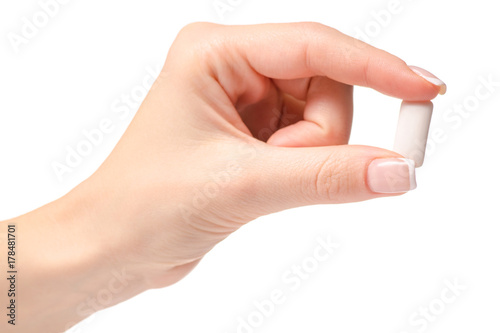 Female hand chewing gum
