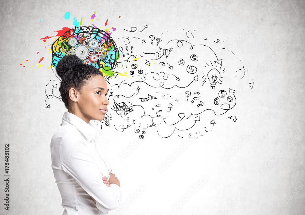 African American woman in jeans, brain cogs African American woman in jeans, brain cogs