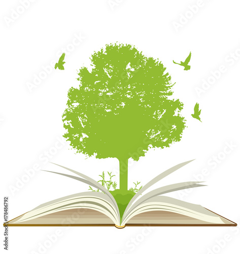 Open book with green tree