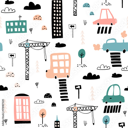 Seamless pattern with hand drawn city print. Cartoon skyscraper, cars, road sign,zebra crossing vector illustration.Perfect for kids fabric,textile,nursery wallpaper © solodkayamari