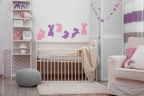 Baby bedroom with paper ani...