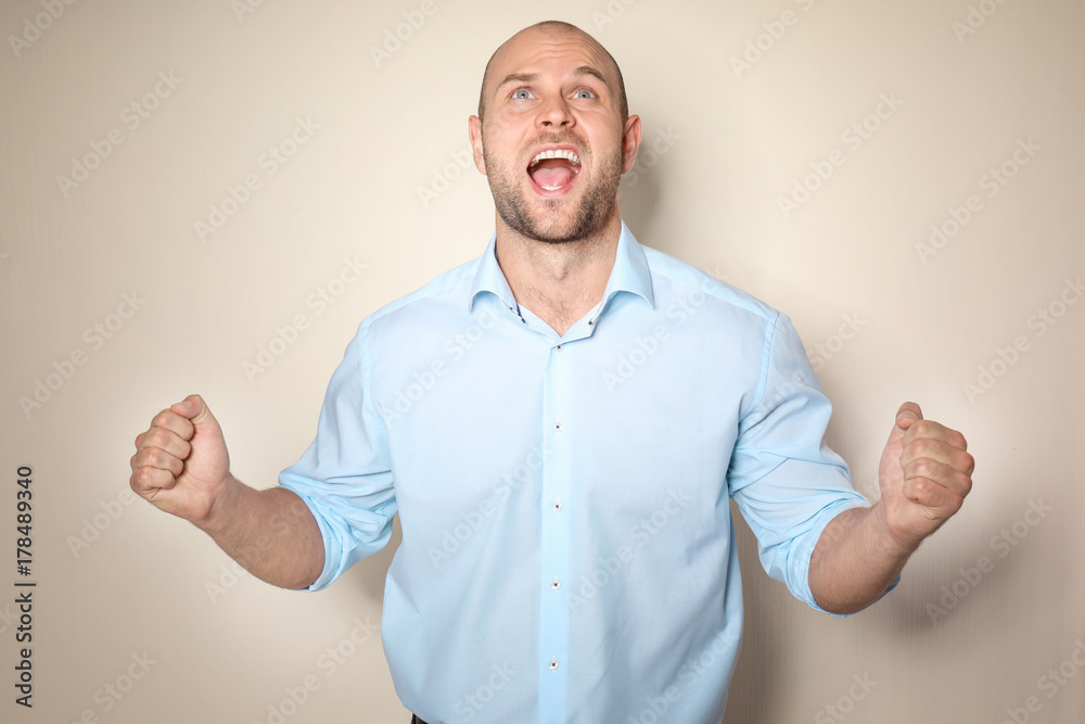 Fototapeta premium Young man on light background