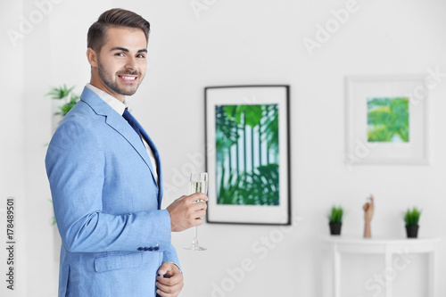 Young man in art gallery