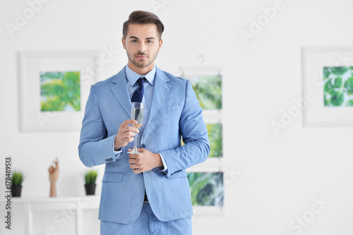 Young man in art gallery